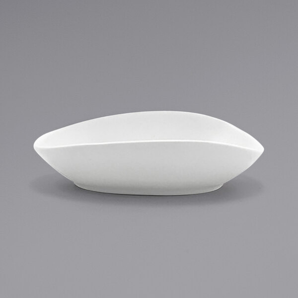 A Front of the House Tides white oval porcelain ramekin.