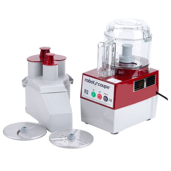 A Robot Coupe commercial food processor with a clear bowl, lid, and two discs.