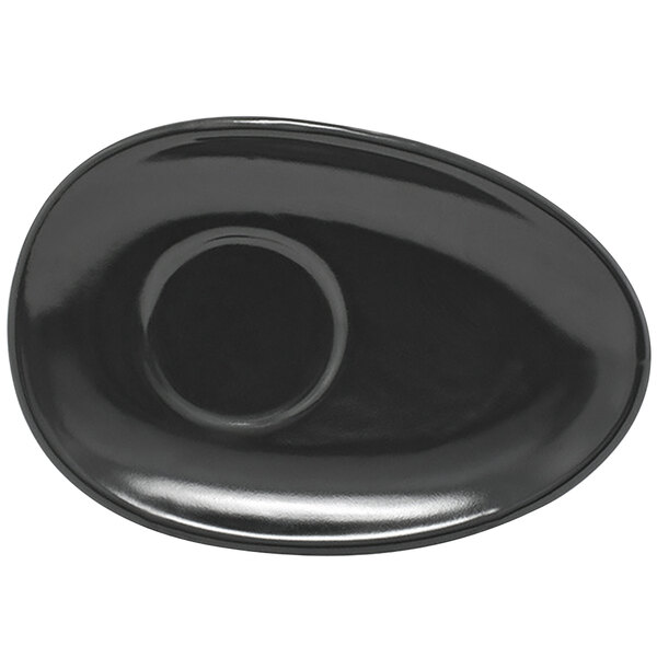 A black oval plate with a white oval in the middle.