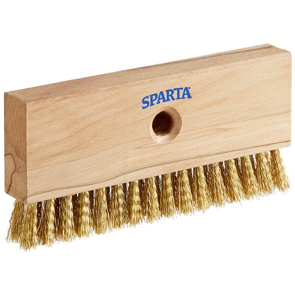 A Carlisle wooden brush head with gold bristles.