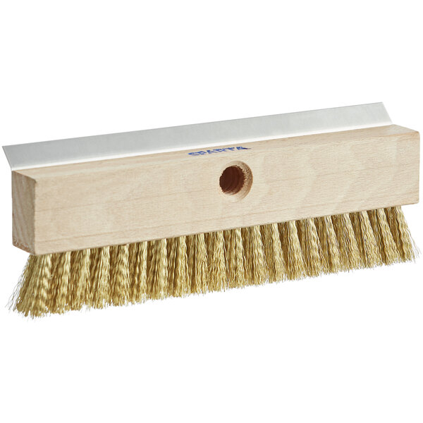 A Carlisle wooden brush head with a scraper and gold bristles.