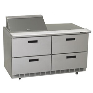 A stainless steel Delfield refrigerated sandwich prep table with 4 drawers.