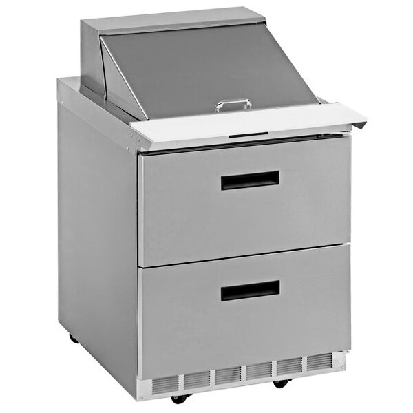 A stainless steel Delfield 2 drawer refrigerated prep table with wheels.