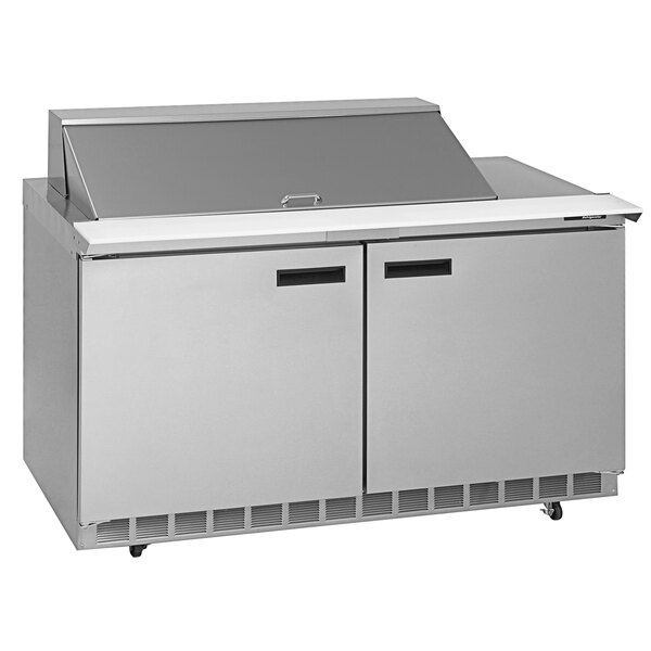 A stainless steel Delfield sandwich prep table with two doors.
