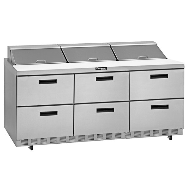 A Delfield stainless steel refrigerator with six drawers.