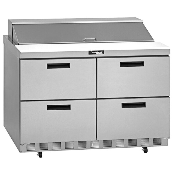 A stainless steel Delfield commercial sandwich prep refrigerator with four drawers.