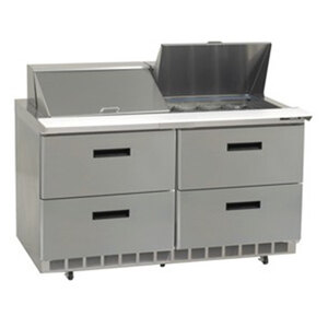 A Delfield stainless steel refrigerated sandwich prep table with drawers.