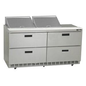 A Delfield stainless steel refrigerated sandwich prep table with 4 drawers on a counter.