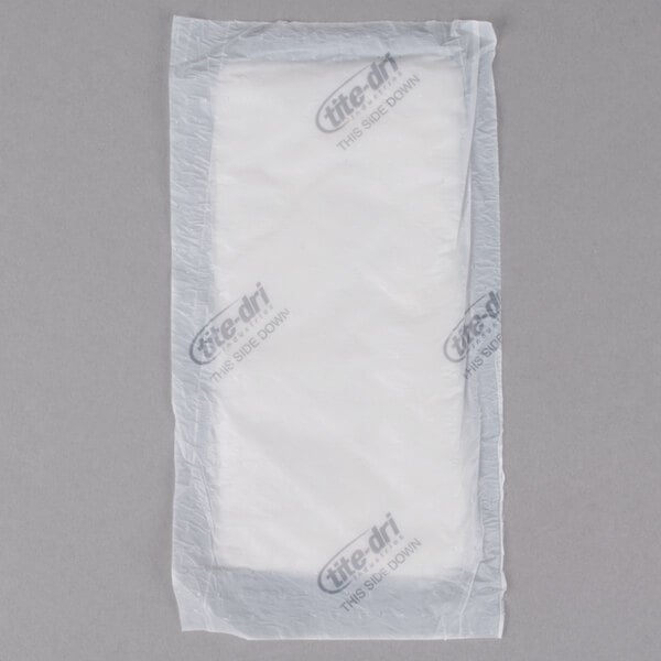 A white plastic bag of white rectangular Absorbent Meat Pads with a black label.