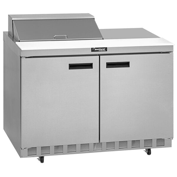A stainless steel Delfield refrigerator with two doors.