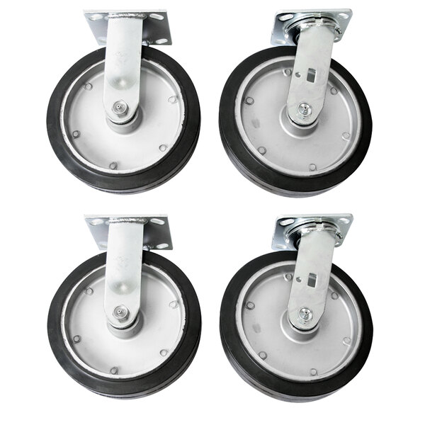 A set of 4 black and silver Wesco caster wheels with white rubber on the wheels.