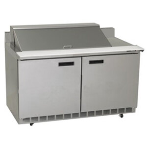 A stainless steel Delfield refrigerator with two doors and a mega top counter.