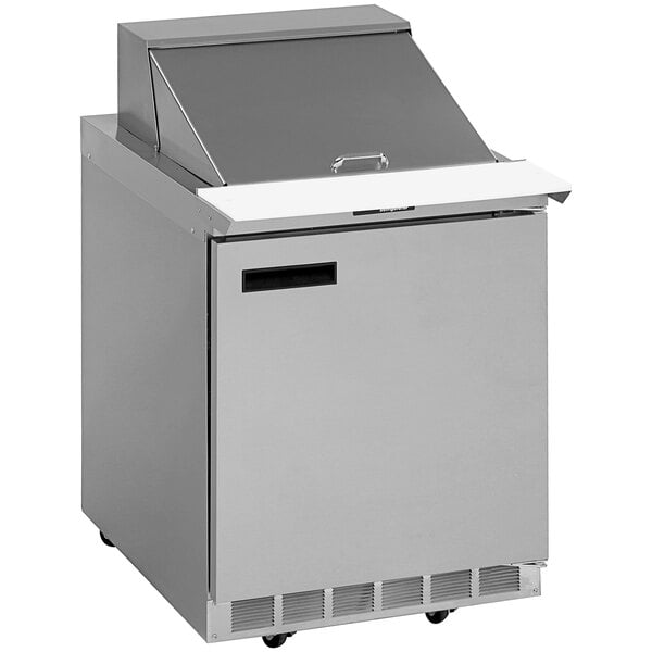 A stainless steel Delfield refrigerator with a lid open.