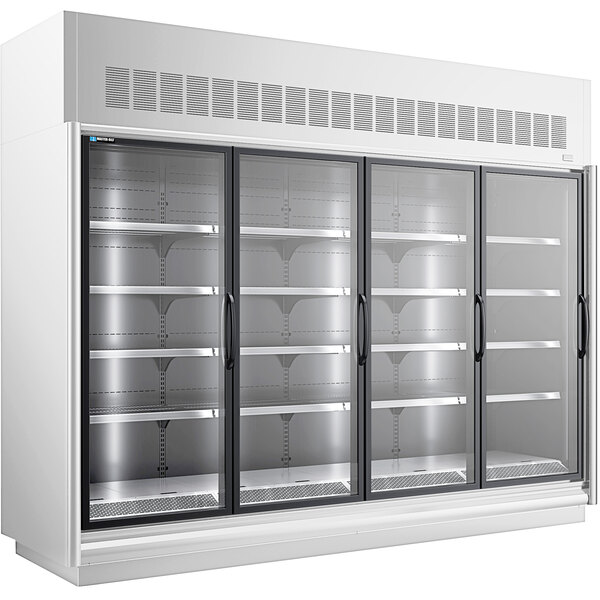 A white Master-Bilt glass door merchandiser freezer with three doors open.