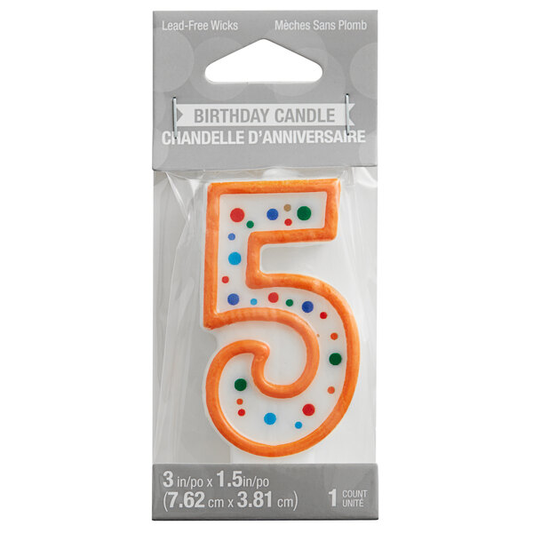 A package containing a Creative Converting polka dot candle shaped like the number five.