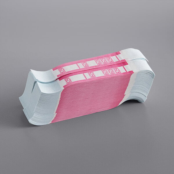 A stack of pink and white self-adhesive currency straps.