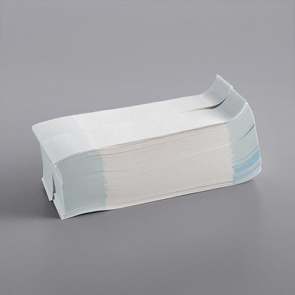 A large stack of white self-adhesive currency straps.