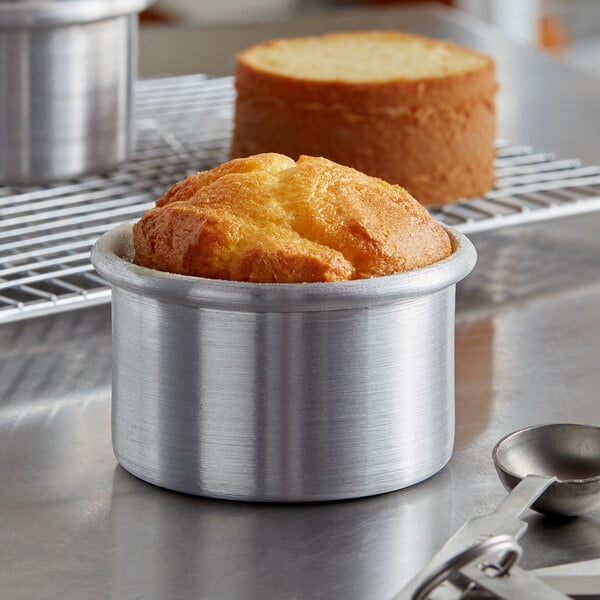 A cheesecake in a Baker's Mark mini cheesecake pan with a removable bottom.