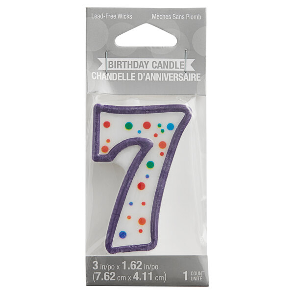 A Creative Converting birthday candle with the number seven and colorful dots on it.