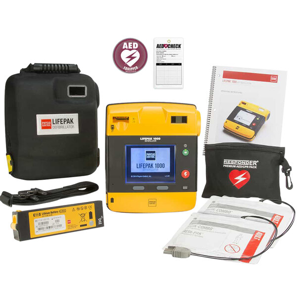 A black bag with a yellow and black Physio-Control AED inside and white accessories.