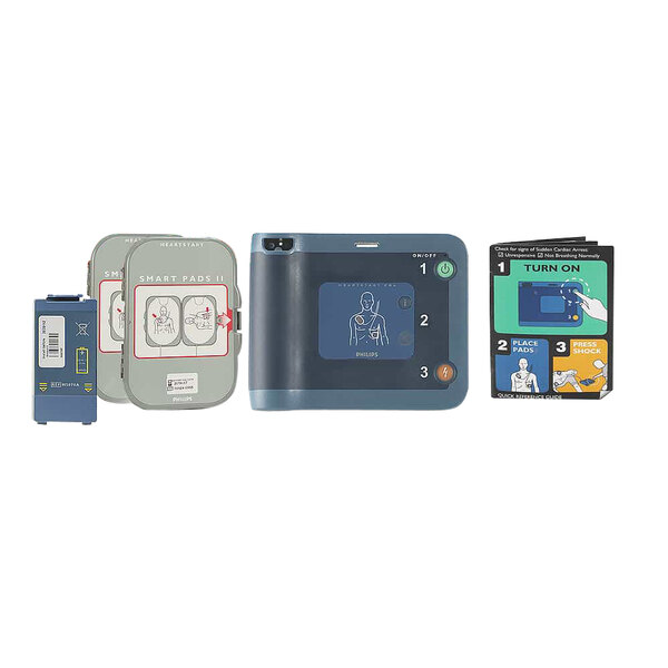 A Philips HeartStart FRx AED medical device with instructions.