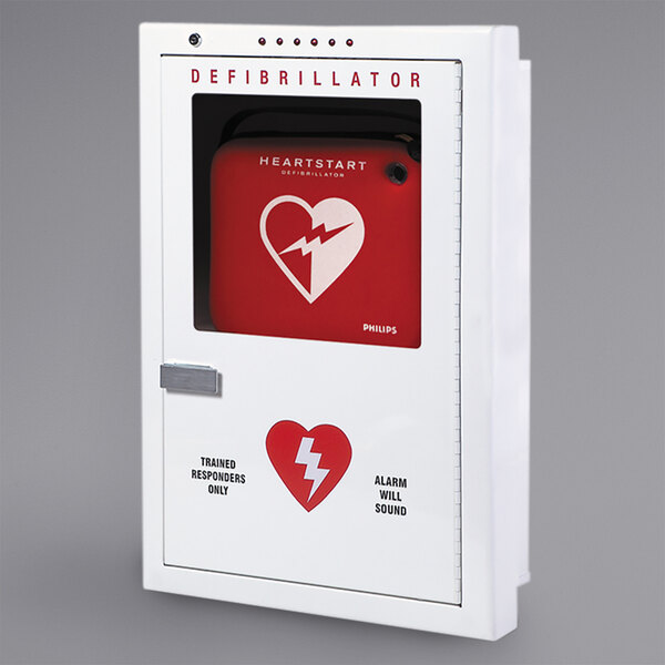 A white Philips red semi-recessed mount AED cabinet with a defibrillator inside.
