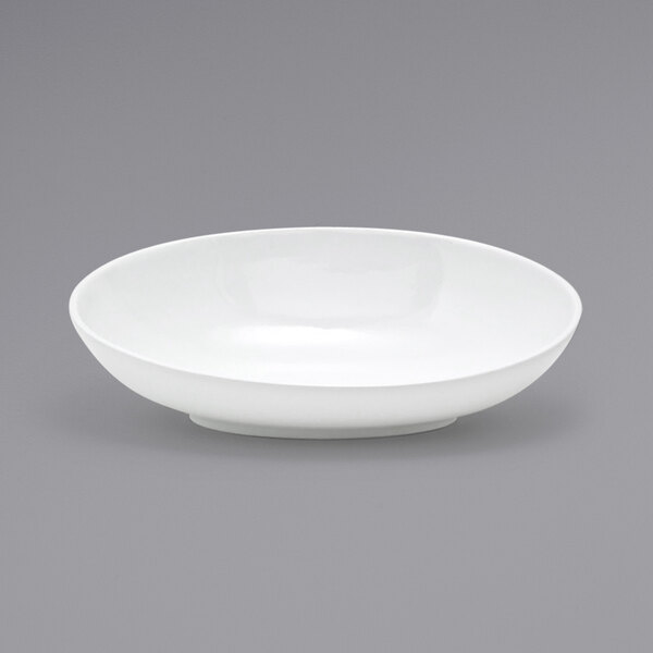 A Front of the House white porcelain oval bowl on a gray background.