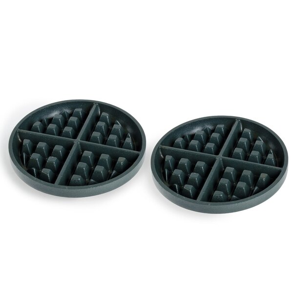 A pair of round plastic plates with holes in them.