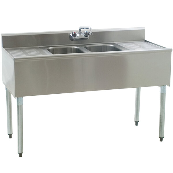 An Eagle Group stainless steel underbar sink with two bowls and a faucet.