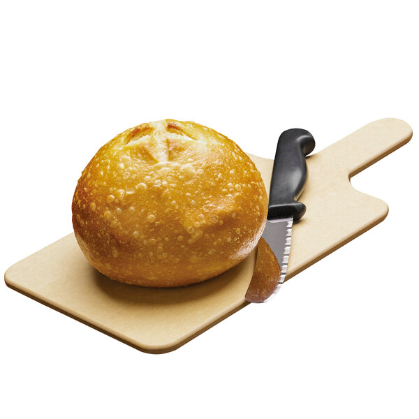 A bread roll and knife on a Tomlinson Richlite wood fiber bread board.