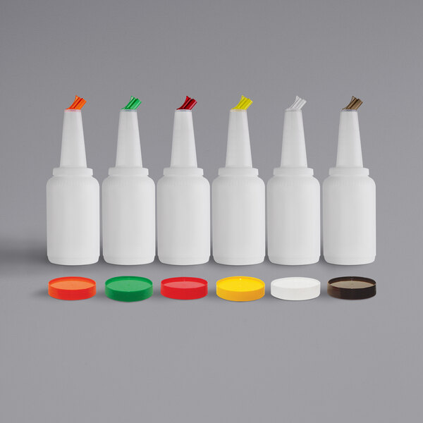 A row of white Tablecraft PourMaster bottles with different colored caps.