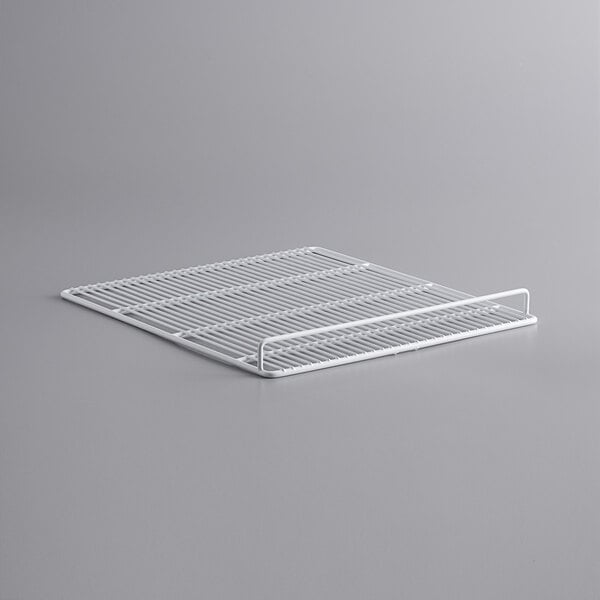 A white metal wire shelf for an Avantco deli case.