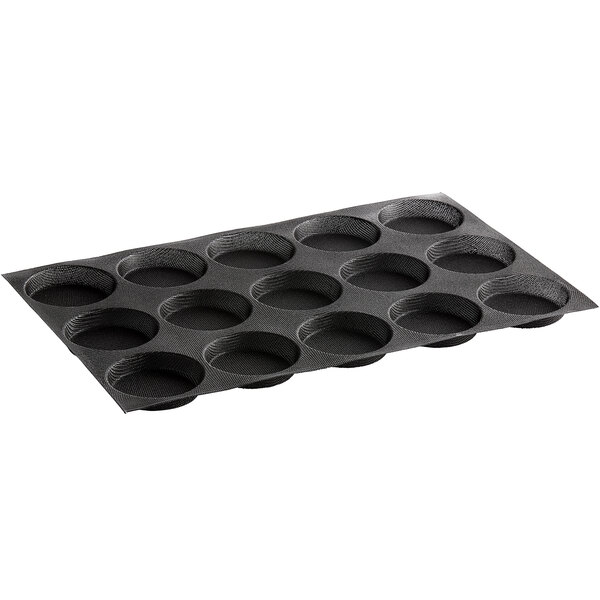 A black Sasa Demarle Flexipan silicone bread mold with 15 round cavities.