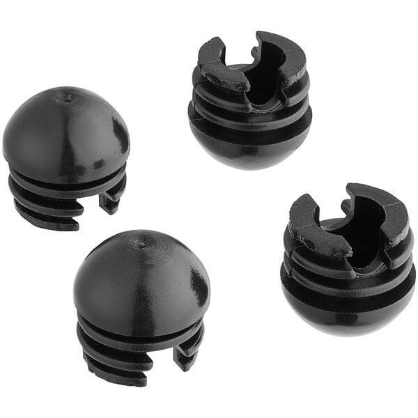 Three black round rubber feet with holes.