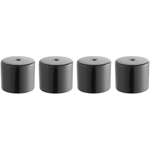 A row of black Lancaster Table & Seating rubber cylinder caps.