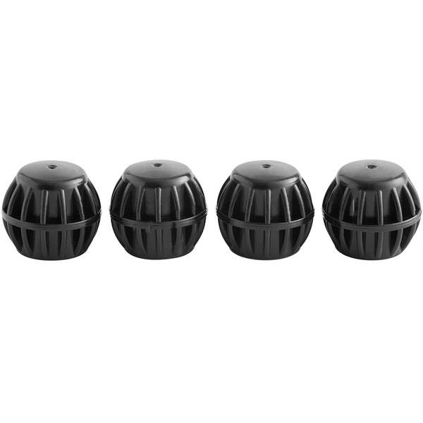 A row of black round rubber feet with holes.