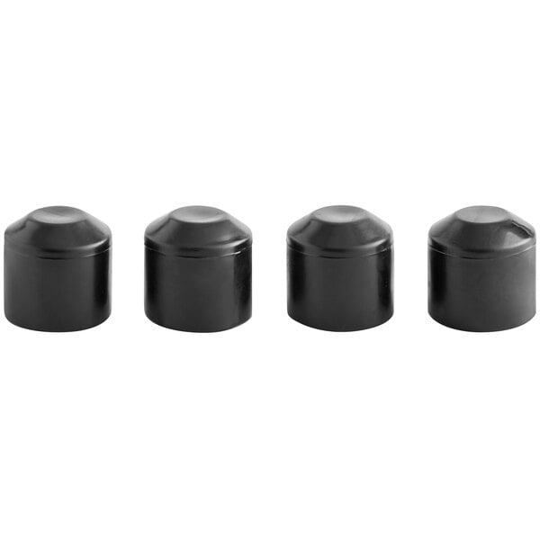 A row of black Lancaster Table & Seating rubber caps.