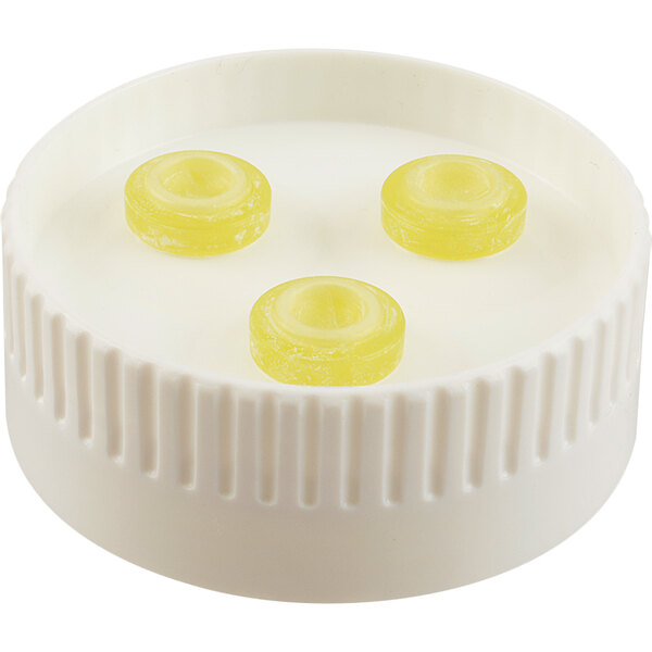 A white cap with three yellow dispensing valves.