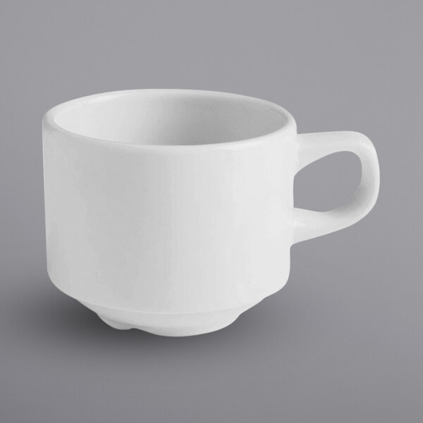 A close-up of a white Corona by GET Enterprises stackable porcelain coffee cup with a handle.