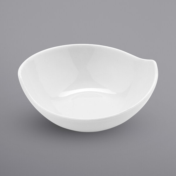 A white bowl with a curved surface.
