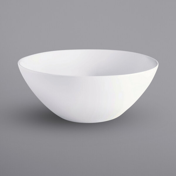 A close-up of a Corona by GET Enterprises bright white porcelain salad bowl.