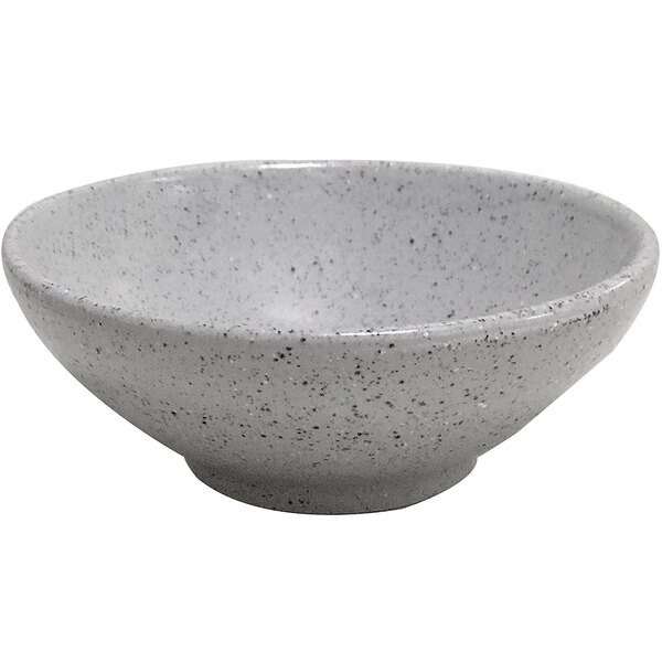 A white bowl with speckled gray specks.