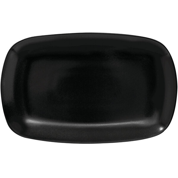 A black rectangular platter with a white spot.