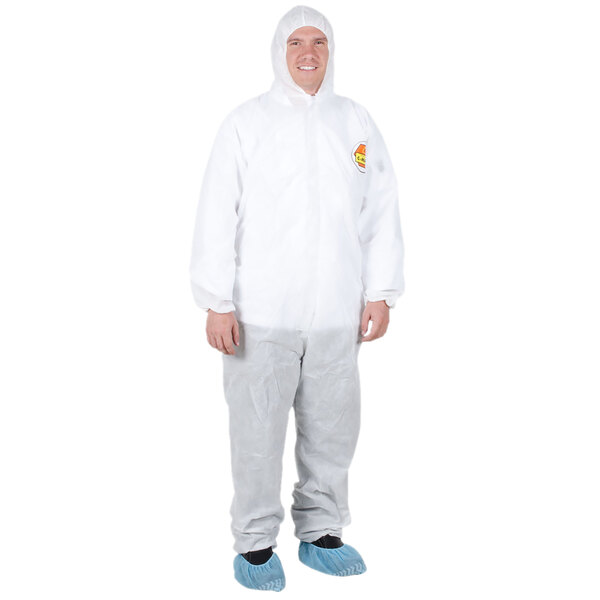 A man wearing a white Cordova Premium polypropylene coverall with a hood.