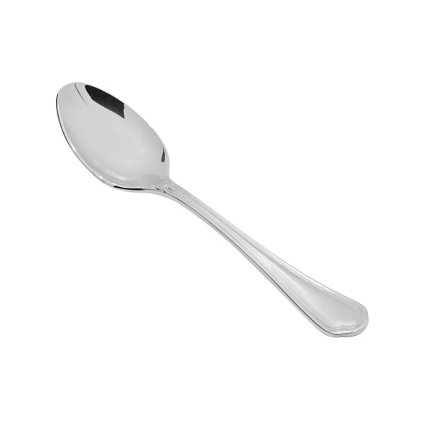 A close-up of a Fortessa Medici stainless steel demitasse spoon with a silver handle.