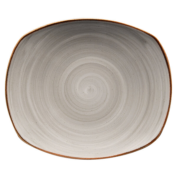 A grey porcelain oval plate with a spiral pattern.