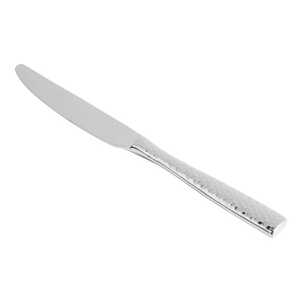 A silver Fortessa Lucca stainless steel dessert knife with a faceted handle.