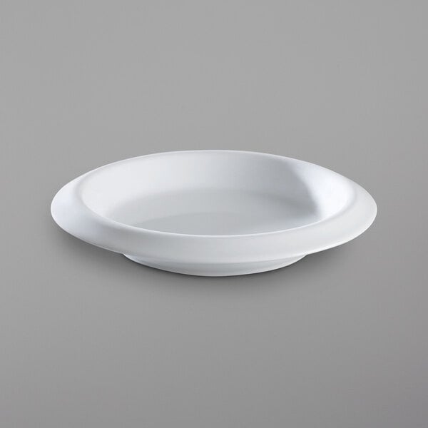 A white Corona by GET Enterprises porcelain salad bowl.