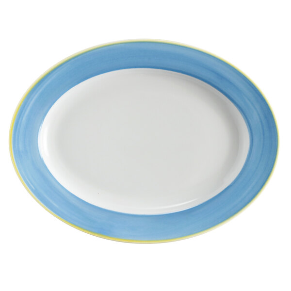 A white porcelain oval platter with a blue and yellow rim.