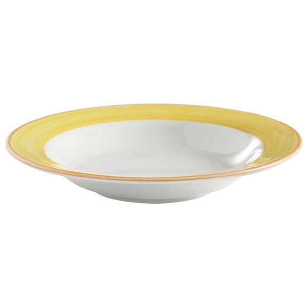 A white bowl with yellow rim.